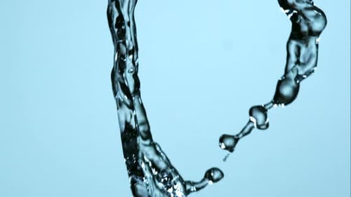 Water pouring and splashing in ultra slow motion 1500fps on a reflective surface - WATER POURS