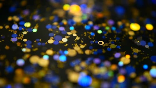 Abstract Footage of Blue and Gold Glittering Bokeh Lights