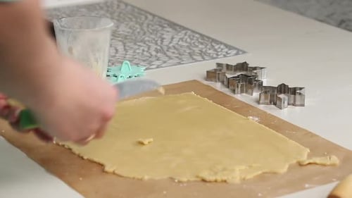 The Woman Cuts The Rolled Biscuit Dough. Cooking Marshmallow Sandwiches.