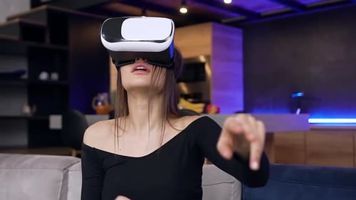 Woman Experiencing Virtual Reality with Headset