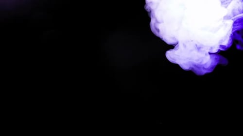 Abstract Purple Smoke on Black Background