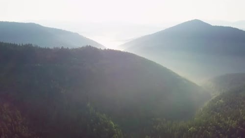 Mountain Peaks and Morning Sky with Smooth Moving Clouds