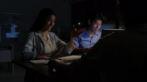 Business people working to late night