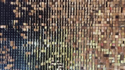 Shimmering Gold Sequin Wall with Abstract Reflections