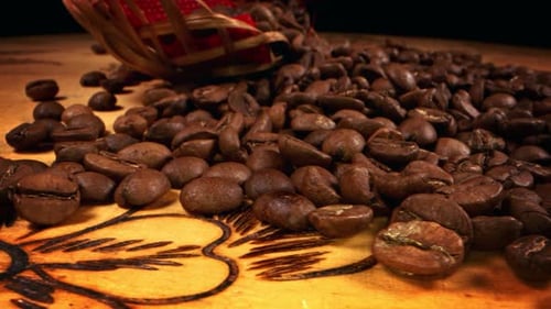 Close up of Coffee Beans on Wooden Surface
