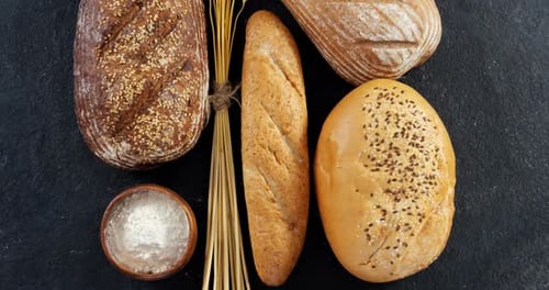 Bread loaves with wheat grains