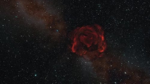 Flying Through Deep Space with Red Nebula and Starfield