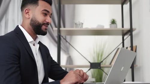 Man in Suit on Video Call
