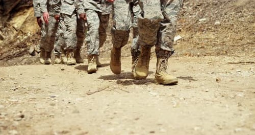Military troops walking at boot camp