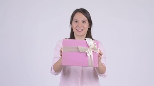 Smiling Woman Presents Pink Birthday Gift