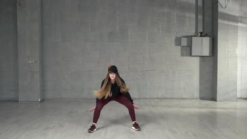 Female Modern Style Dancer Dancing in Studio