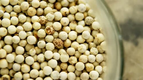 Bowl Full of Aromatic White Peppercorns
