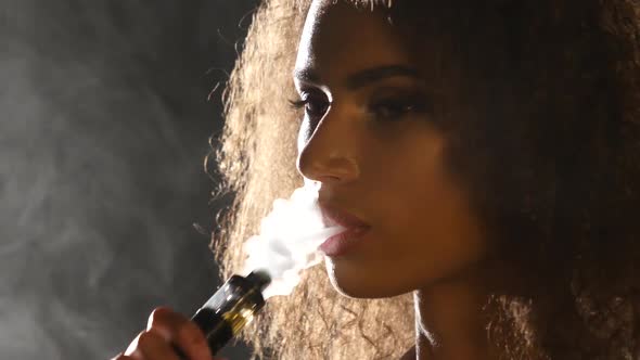 girls exhaling cigarette smoke Woman Through Nose" by Stocksy Contributor "Marko" Woman smoking a cigarette Exhaling