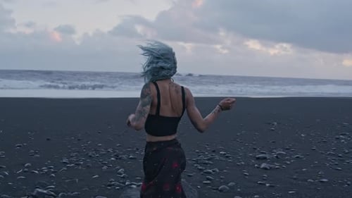 Cool Girl Running On Black Beach