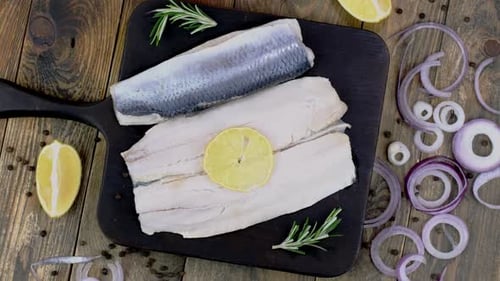 Fresh Herring Fillets with Lemon and Red Onion