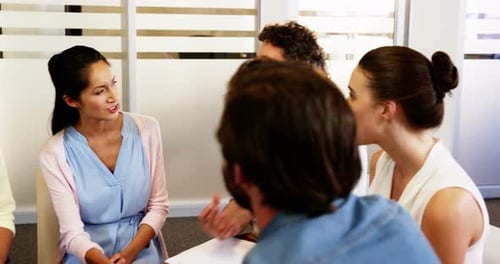 Adults in a Meeting or Therapy Session