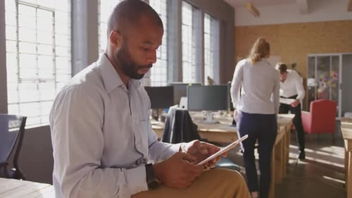 Young creative professionals working in a modern office