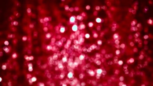 Lazo rojo abstracto con purpurina bokeh de Navidad y Nochevieja