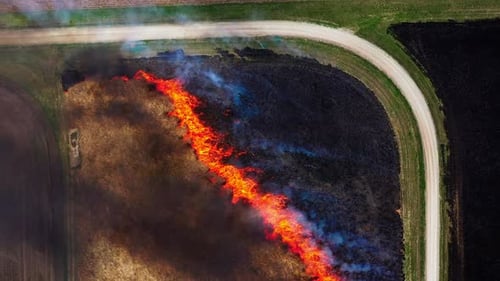 Aerial View of Fire in a Rural Field