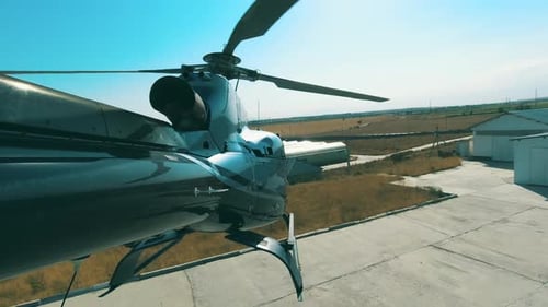 Takeoff of the Helicopter From the Helicopter Base. View From the Tail of the Helicopter in