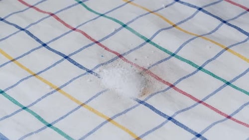 White Powder Falling on a Stain on Cloth