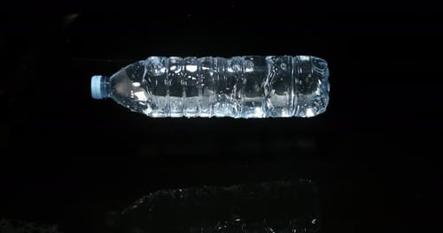 Water Bottle Drops and Splashes in Slow Motion