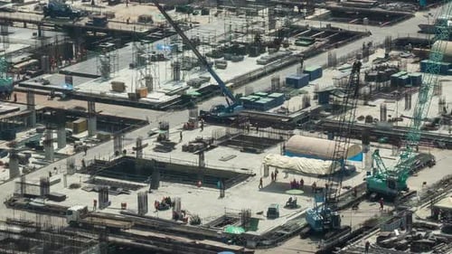 Time Lapse of Construction Site with Heavy Construction Machinery in Metropolis