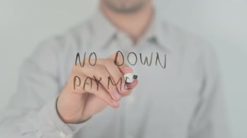 Adult Writes 'No Down Payment' on Glass Surface