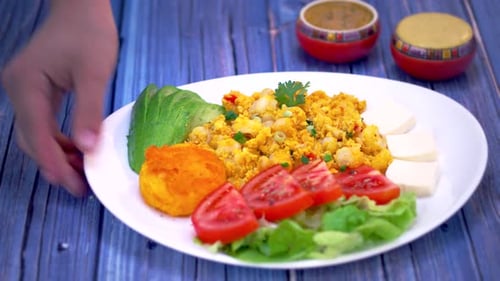 Colorful and Fresh Dish Displayed on Blue Table
