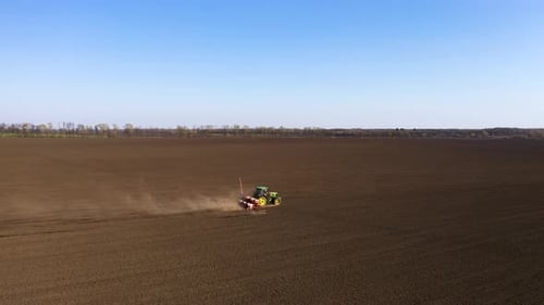Agriculture Field And Tractor
