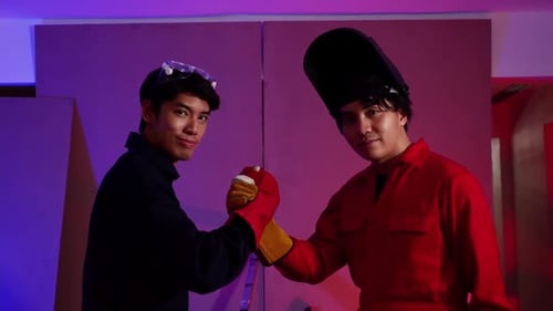 Portrait of young industrial technicians in the factory.