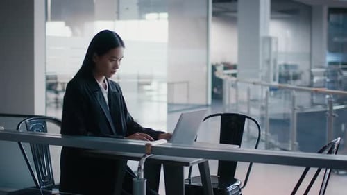 Korean Business Lady Using Laptop Sitting Working In Coworking Center
