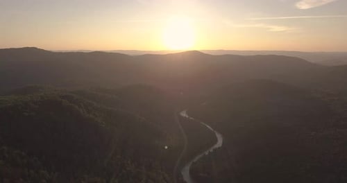 Footage of Sunset Over Ural Mountains with Decreasing Exposure Effect