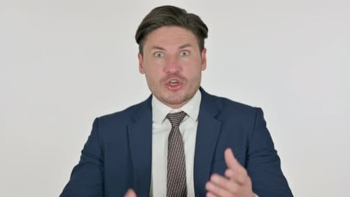 Man in Suit Explains Something on White Background