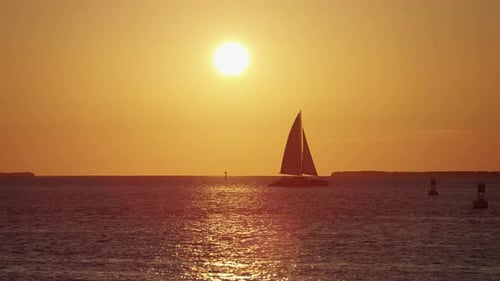 Sailboat Sailing on the Ocean During Sunset