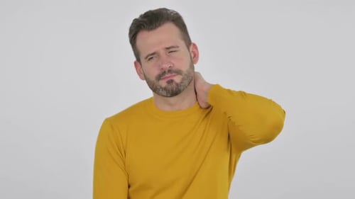 Man Massaging Sore Neck in Pain