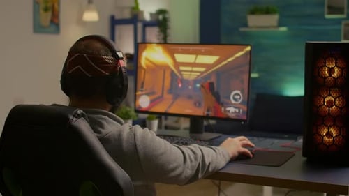 Gamer Wins While Playing Video Game at Home