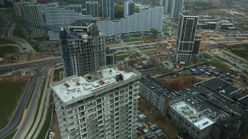Construction of modern multi-storey buildings. Construction of a new city block.