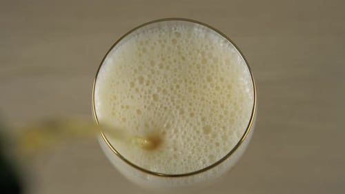 Champagne Being Poured Into Glass Close Up Shot