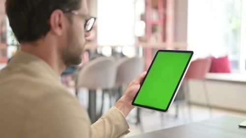 Man Holding Tablet with Chroma Key Green Screen