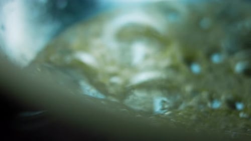 Liquid Boiling with Bubbles in a Pan