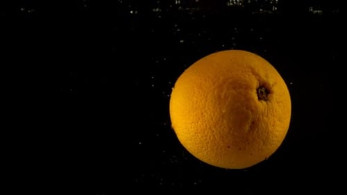 Falling Orange in Water 2
