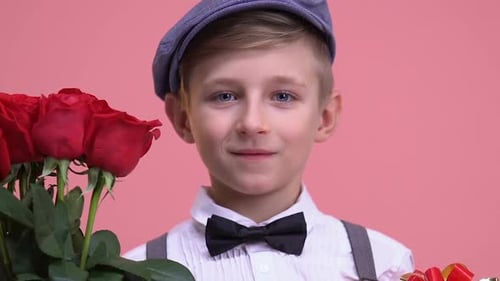 Boy with Roses and Gift for Special Occasion