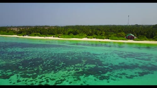 Aerial drone tourism of luxury resort beach vacation by aqua blue sea and white sand background of a