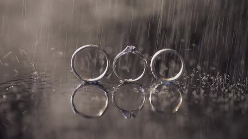 Three Wedding Rings in the Rain