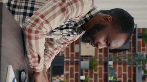 Vertical Video Software Developer Typing Programming Code on Computer Keyboard Turning Head and