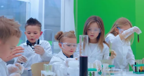 Children Conduct Science Experiments in Laboratory