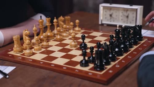 Intense Chess Game Between Two Players