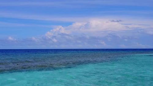 Aerial drone travel of tropical coastline beach by ocean with sand background