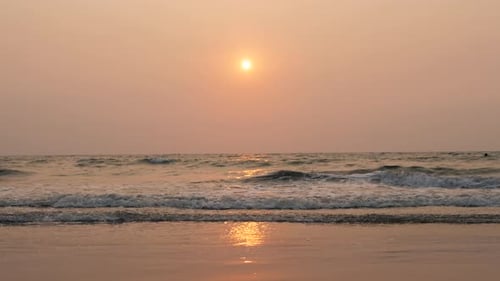 Amazing Beach Sunset with Endless Horizon and Lonely Figures in the Distance and Incredible Foamy